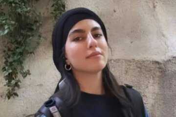 پرچم پرسپولیس روی مزار الهه حسین‌ نژاد